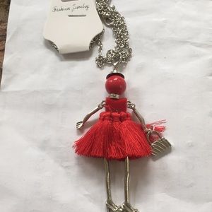 She red doll necklace